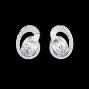 Mango Shaped Oval Solitaire Diamond Earrings